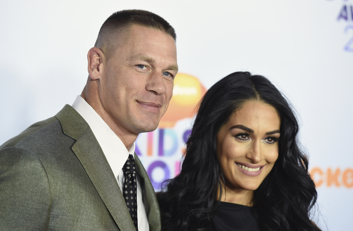 John Cena, left, and Nikki Bella arrive at the Kids' Choice Awards