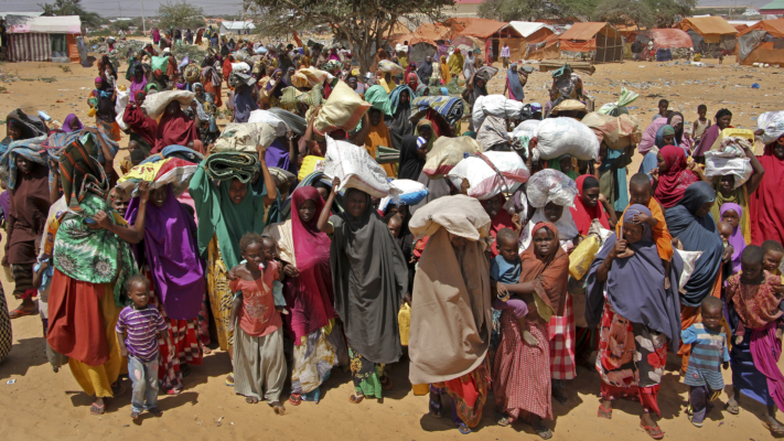 FILE - In this March 30, 2017 file photo, Somalis displaced by a drought arrive at makeshift camps on the outskirts of Mogadishu, Somalia.  (AP Photo/Farah Abdi Warsameh, File)