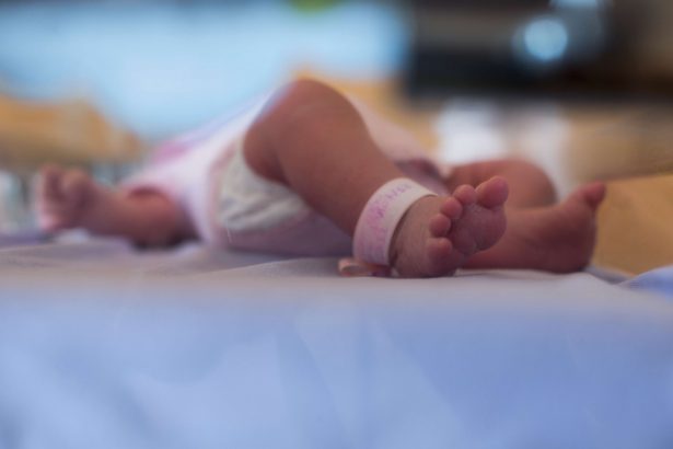 The feet of a newborn baby
