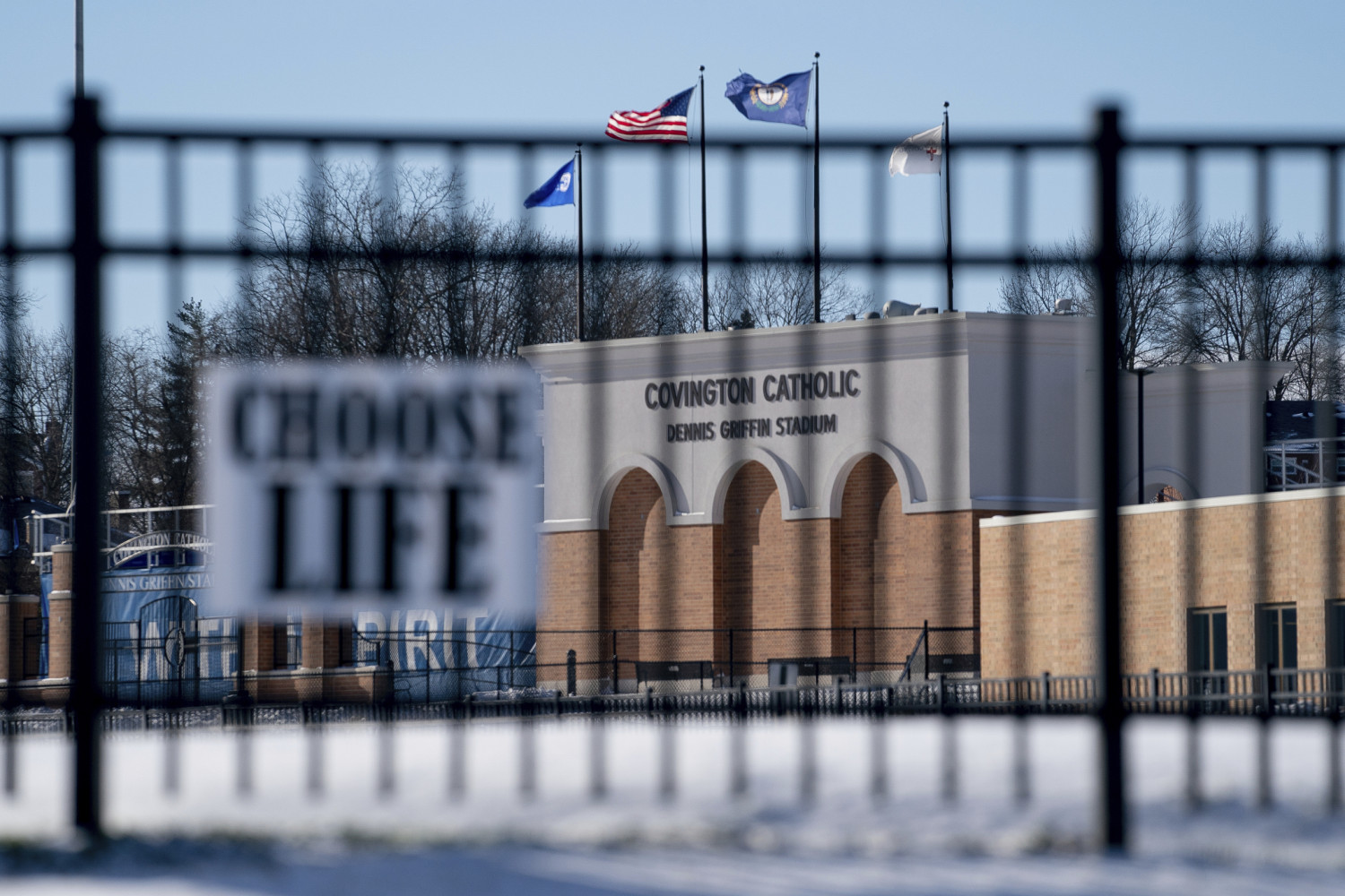 Flags fly over the Covington Catholic High School stadium