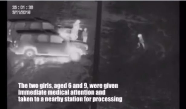 CBP agents attend to injured girls