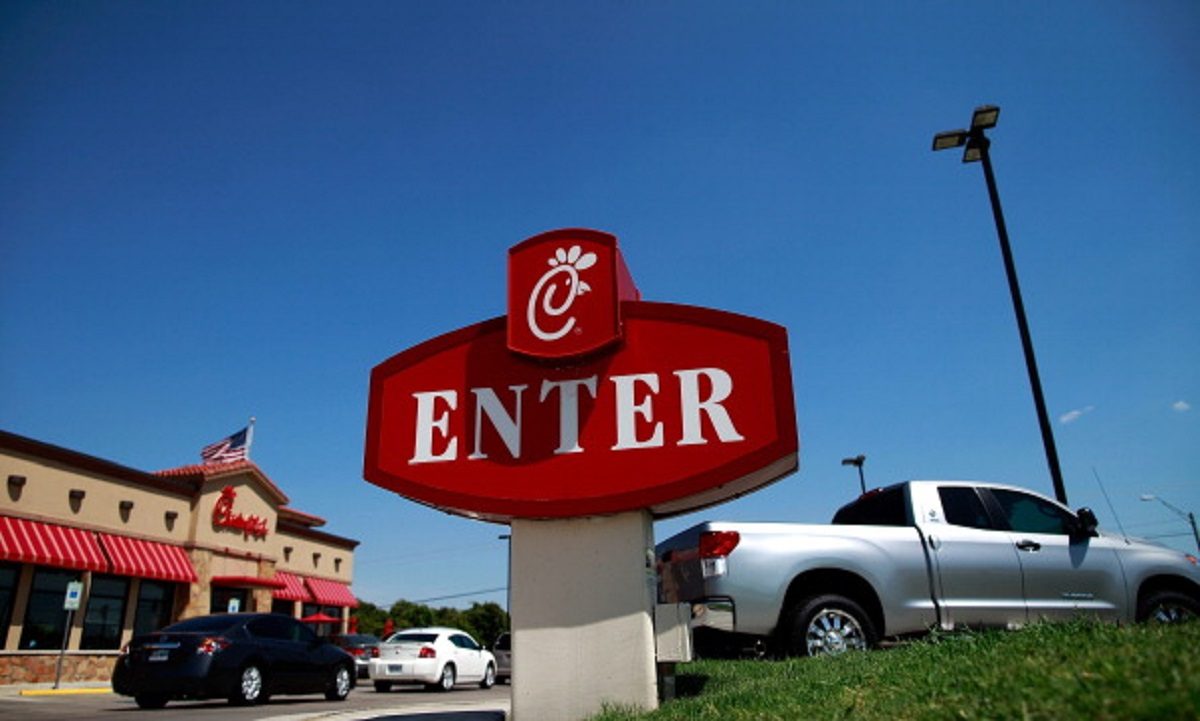 Drive through customers wait in line at a Chick-fil-A resturant