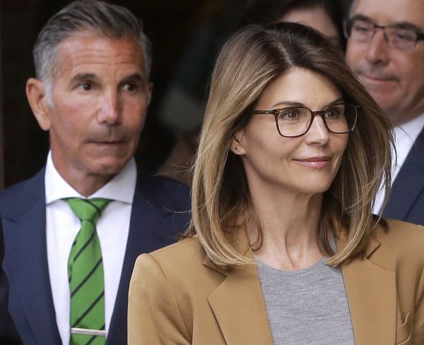 Actress Lori Loughlin (front) and husband,
