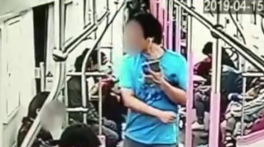 Huang prepares to hit the woman
