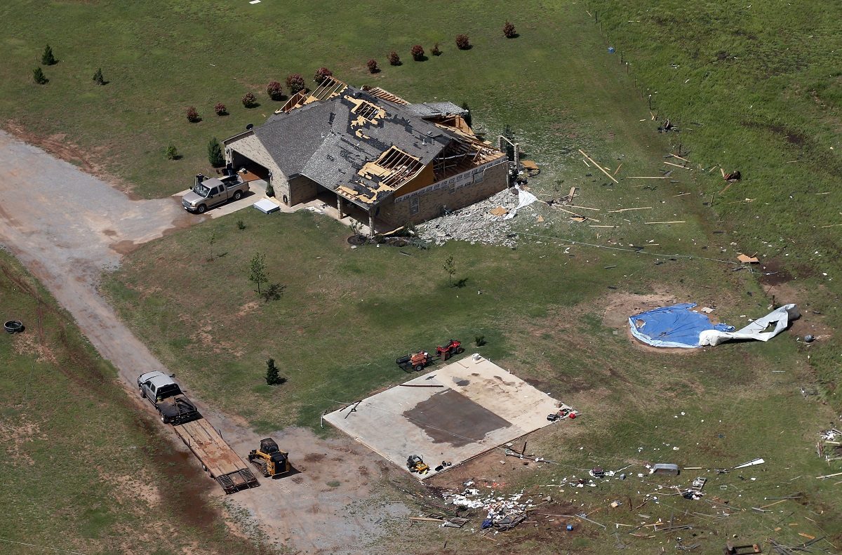 A house damaged in a tornado in Mangum, Okla.