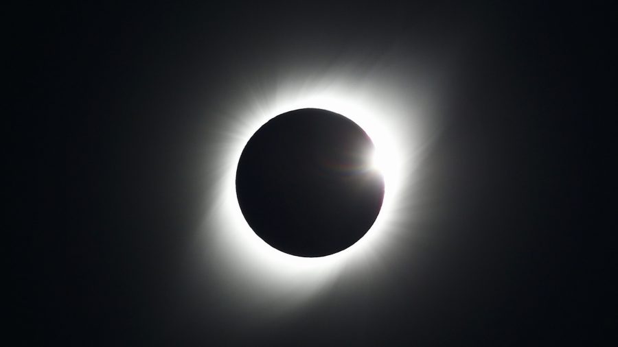 Chileans, Argentines Gape at Total Solar Eclipse in Rare, Irresistible Event