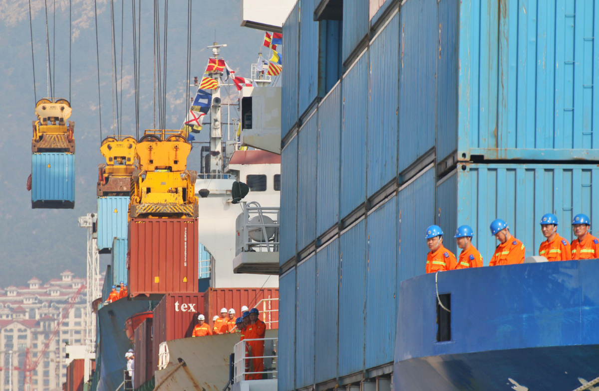 cranes lifting containers