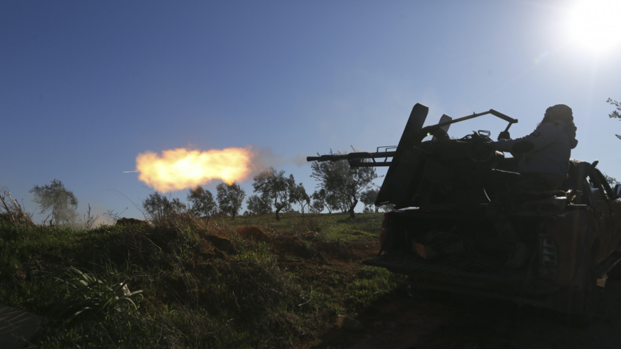Turkey, Syria Fighting Escalates; Refugees Mass at EU Border