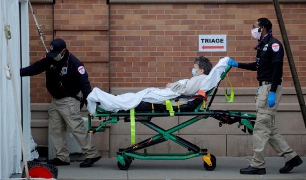 Paramedics take a patient into the emergency center
