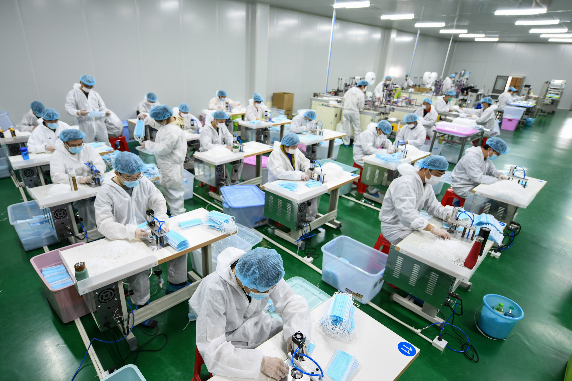 Workers producing face masks