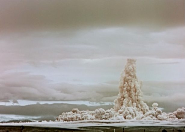 A cloud of smoke and dust rises in the sky after the so-called Tsar Bomba