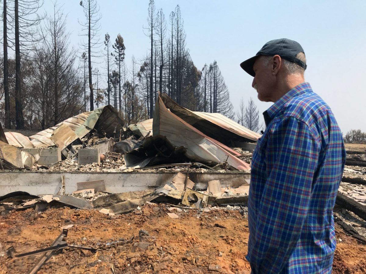 Charles Christianson returns to his destroyed home