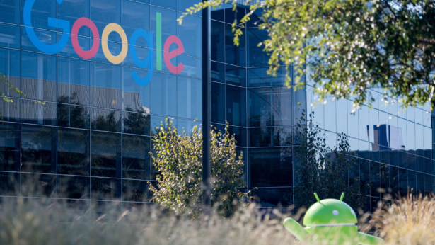 A Google logo and Android statue