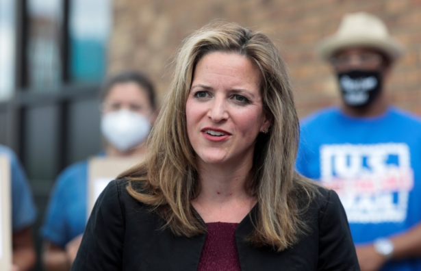 Michigan Secretary of State Jocelyn Benson speaks in support of the United States Postal Service (USPS) outside of a post office in Detroit