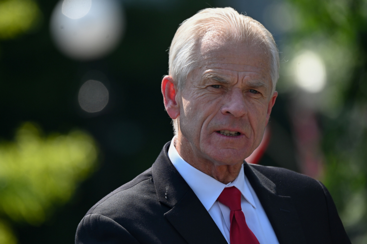 White House adviser Peter Navarro speaks to reporters outside the West Wing in Washington