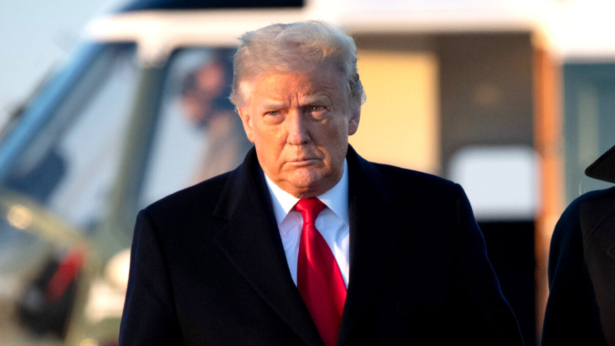 Donald Trump walks to board Air Force One