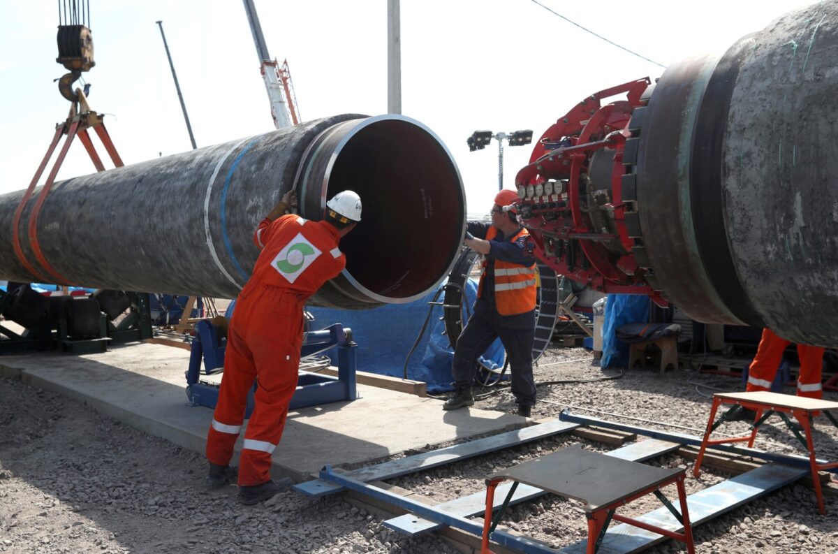 Workers are seen at the construction site of the Nord Stream 2 gas pipeline in Russia