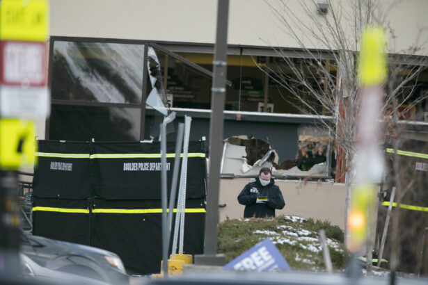Police work on the scene outside of a King Soopers grocery store