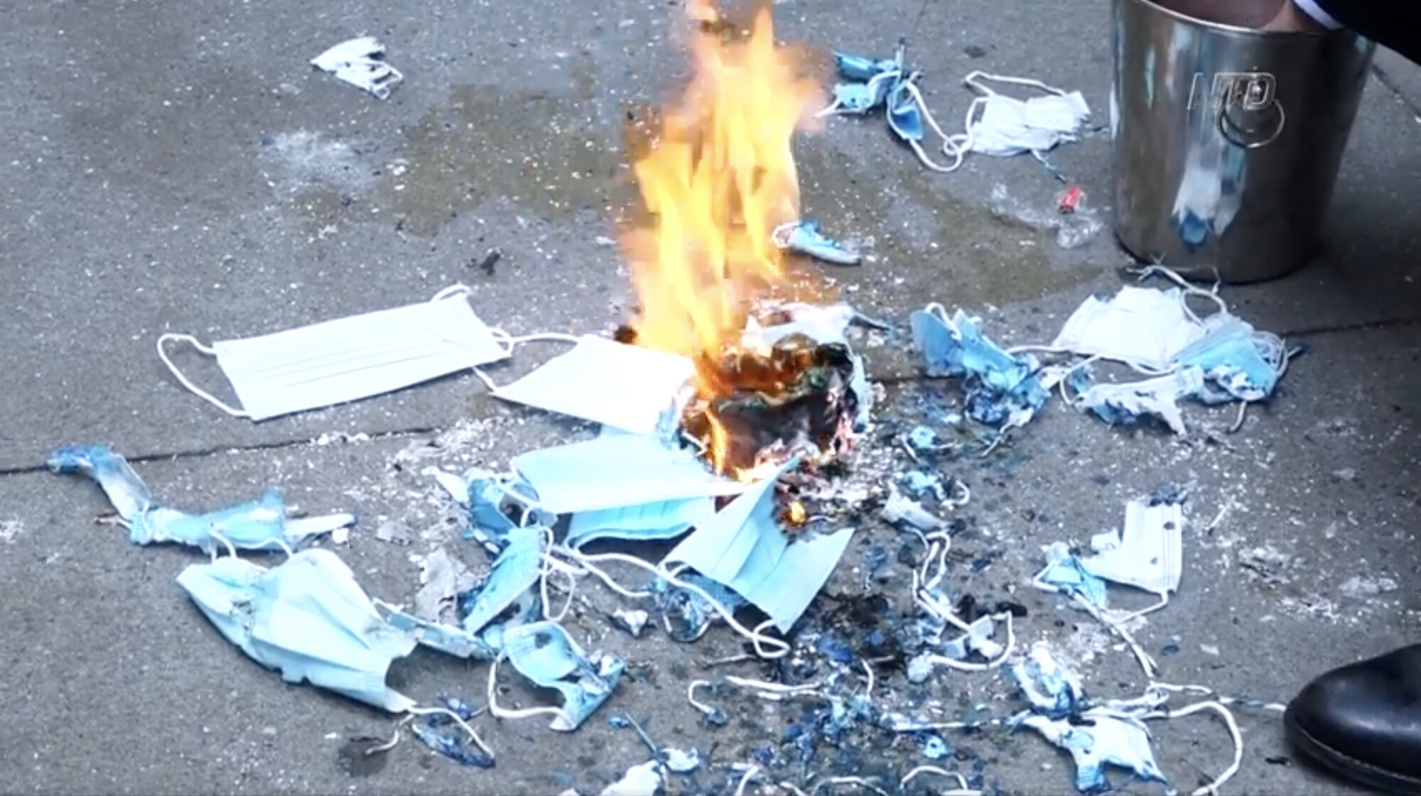 Burning Masks to Celebrate End of New York Mandate