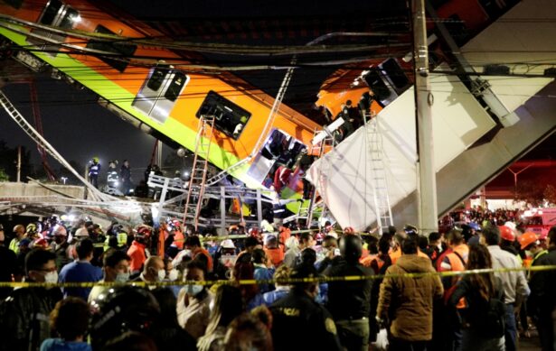 Rescuers work at a site where an overpass