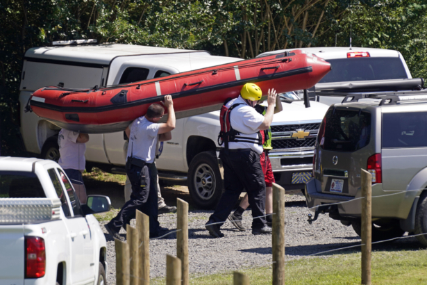Rescue personnel stage along the Dan River