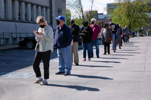 people-line-up-outside-a-career-center