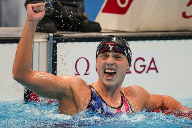 Katie Ledecky, of the United States, reacts after winning