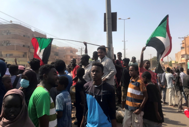 Protesters block a road