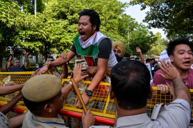 Demonstrator shout slogans as they protest
