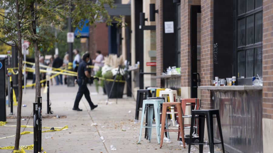 Investigators processed the chaotic scene of a multiple shooting at the bar Truck Park in St. Paul, Minn., that happened after midnight, on Oct. 10, 2021. (Renee Jones Schneider/Star Tribune via AP)