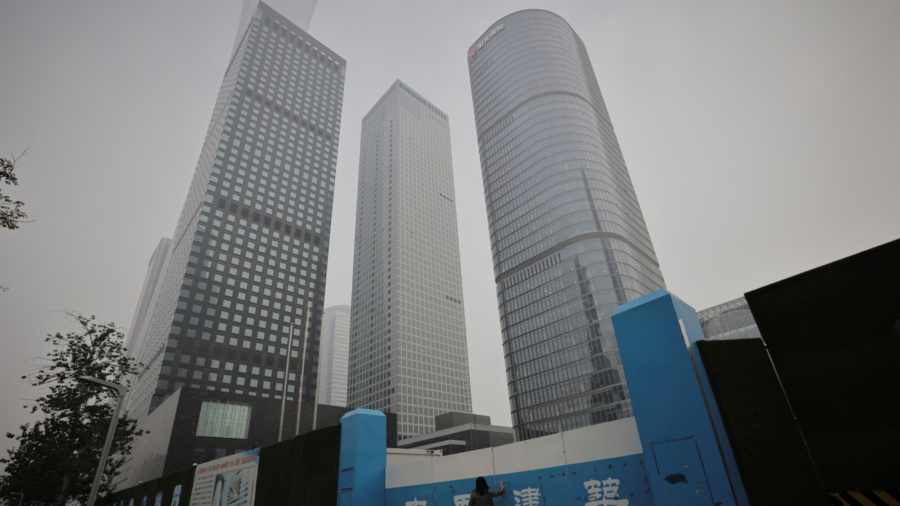 China-Listed Firms Rush to Divest Property Businesses Amid Sector Crackdown
