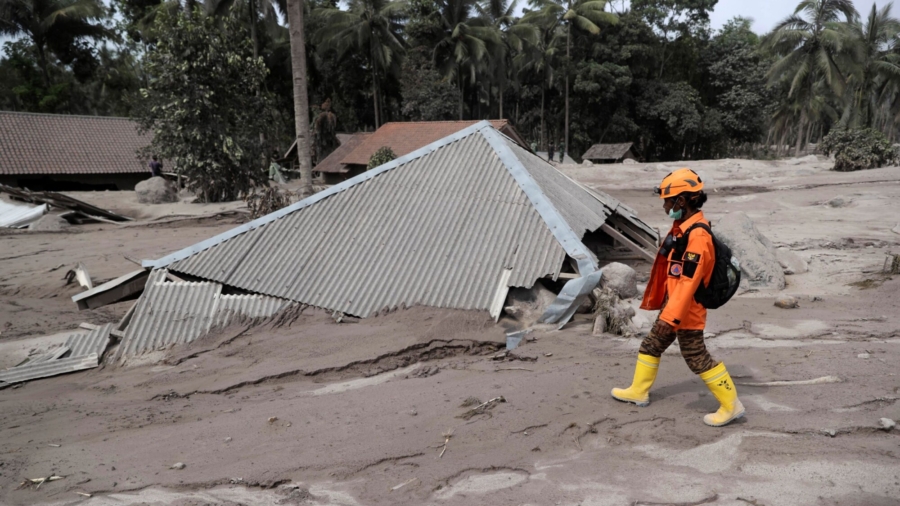 Indonesian Rescuers Dig Through Volcanic Ash After 14 Die