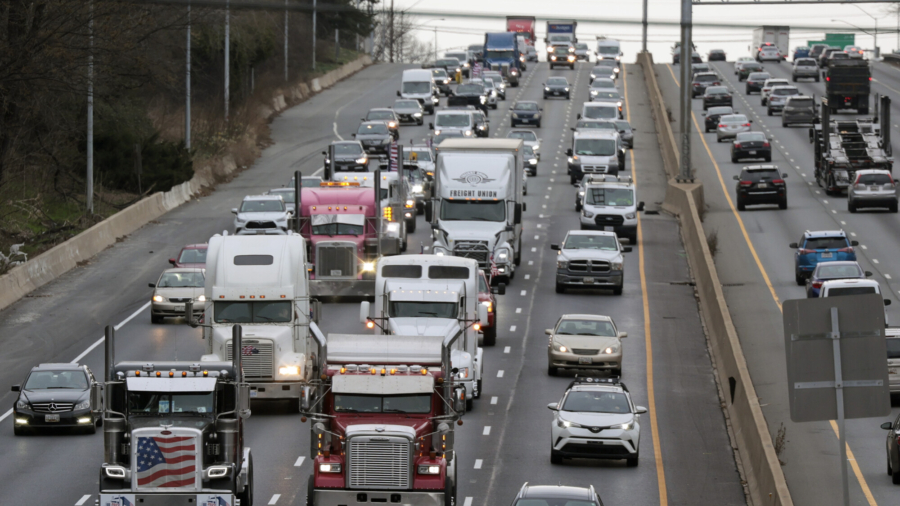 Vehicles in Truck-Led Convoy Ride Through Washington, DC