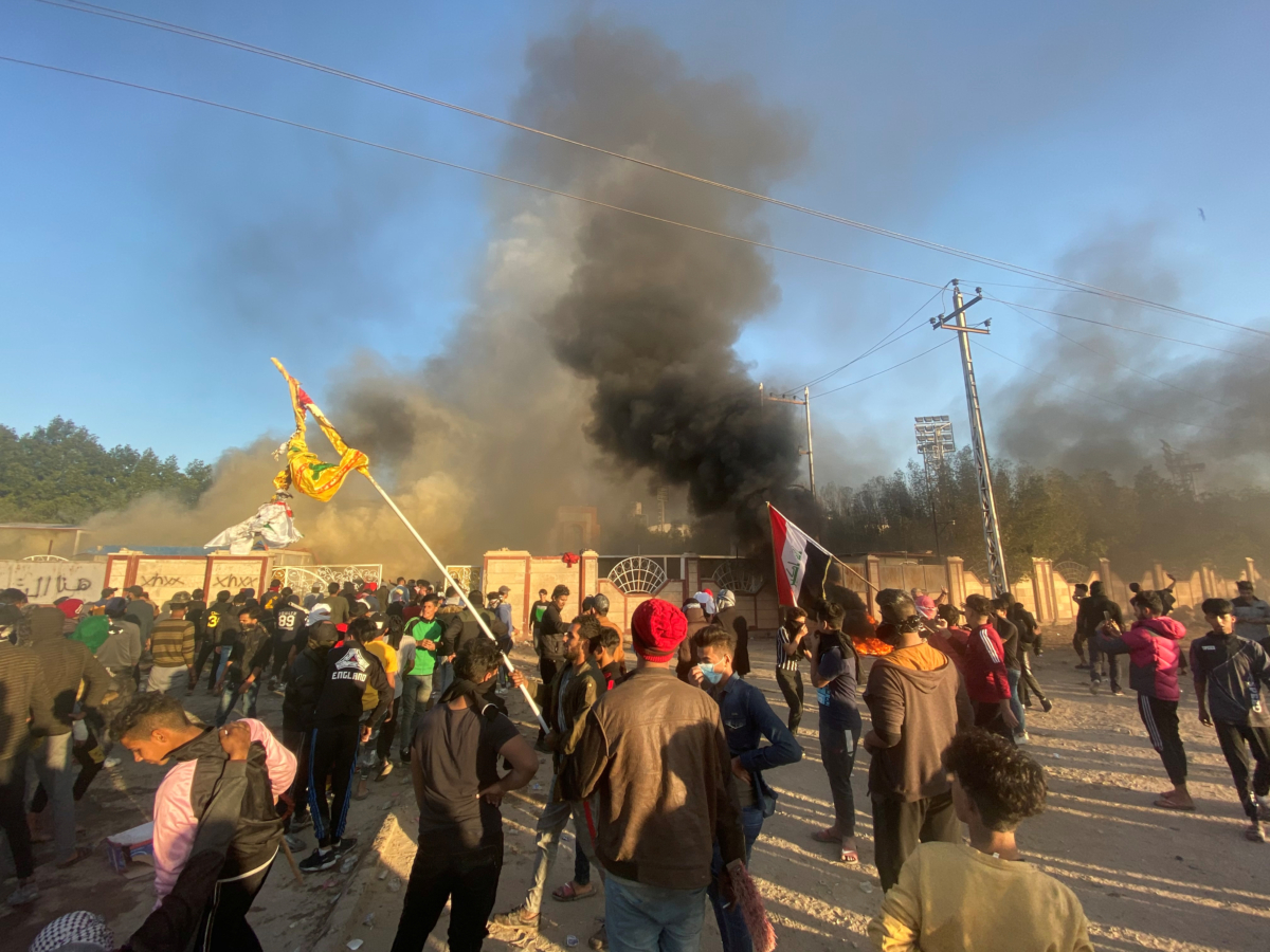 A headquarters building of Popular Mobilization Forces (Hashd al-Shaabi) burns after being torched by demonstrators during ongoing anti-government protests, in Nassiriya, Iraq January 5, 2020. (Stringer/Reuters)