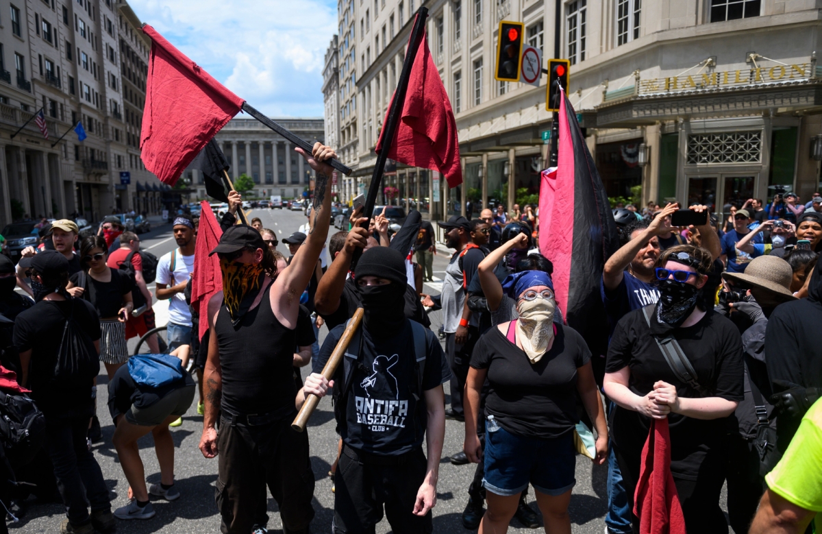 Members of Antifa group march