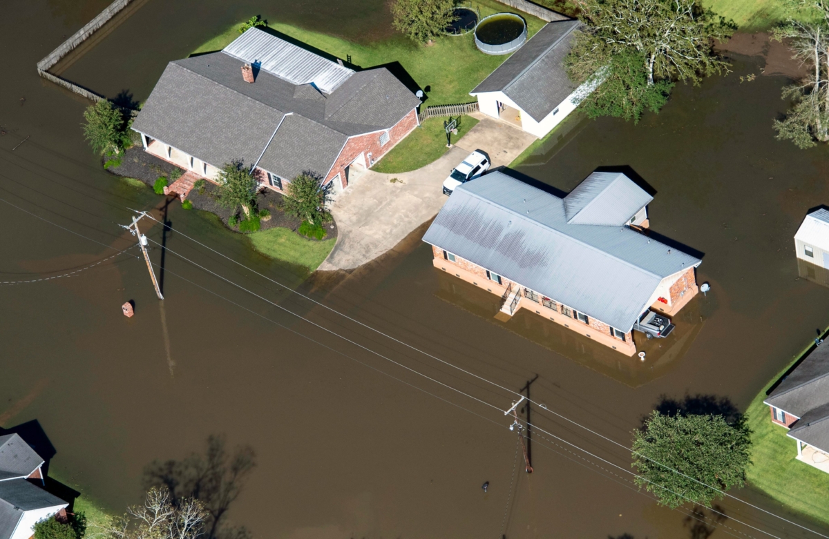 Houses surrounded by flood water