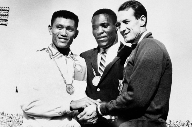 three-way handshake after receiving medals