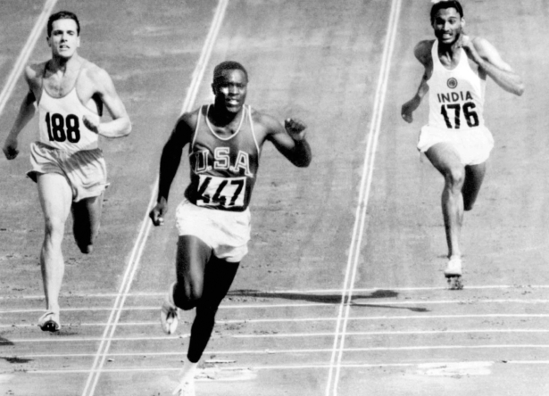 Rafer Johnson finishes the decathlon 100 meter dash
