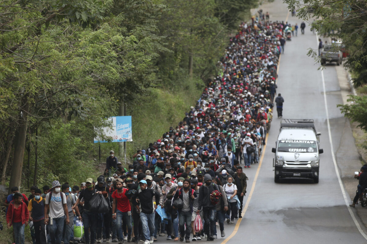 Migrants travelling on highway at Guatemala