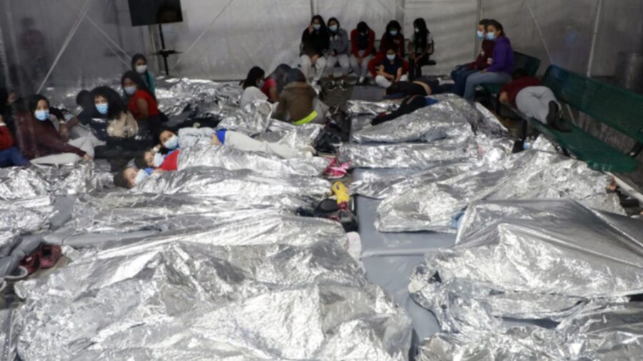 New Border Photos Show Children Sleeping Shoulder-to-Shoulder in Transparent Pen