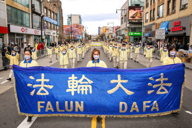 Falun Gong practitioners take part in a parade