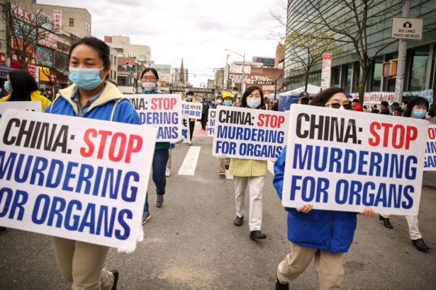 Falun Gong practitioners take part in a parade