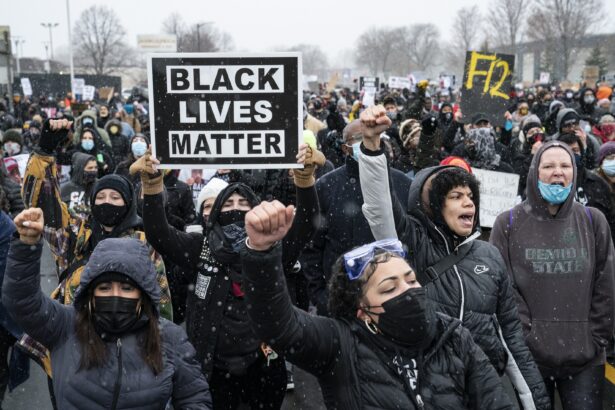 Demonstrators march to Brooklyn Center Police Department