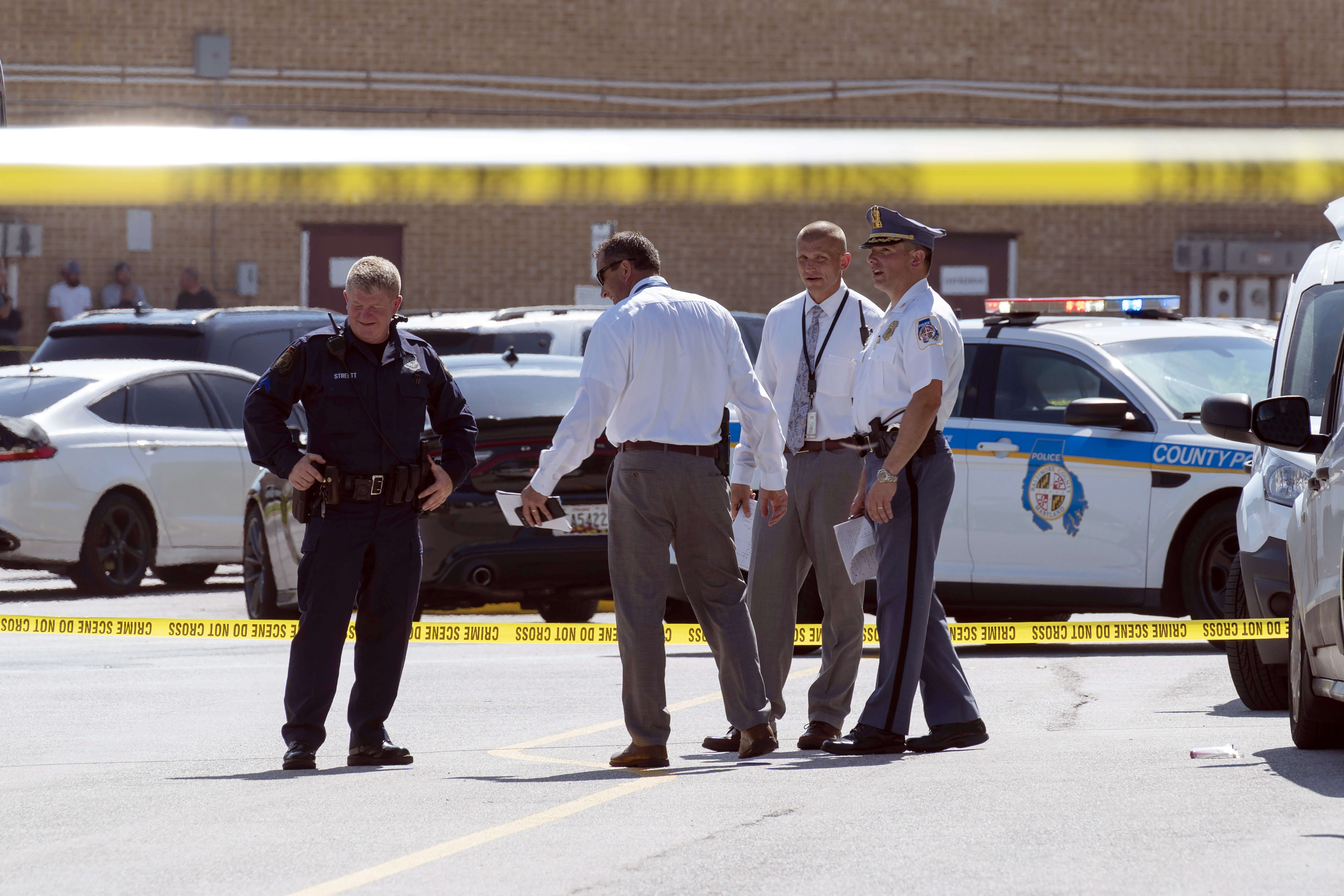 Law enforcement officials confer
