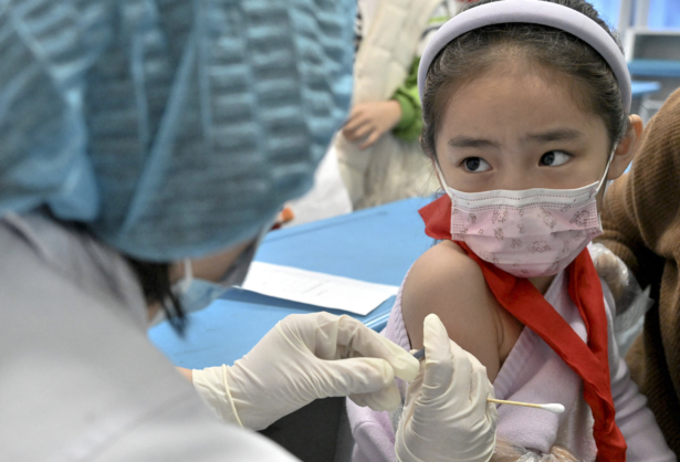 A child receives vaccine